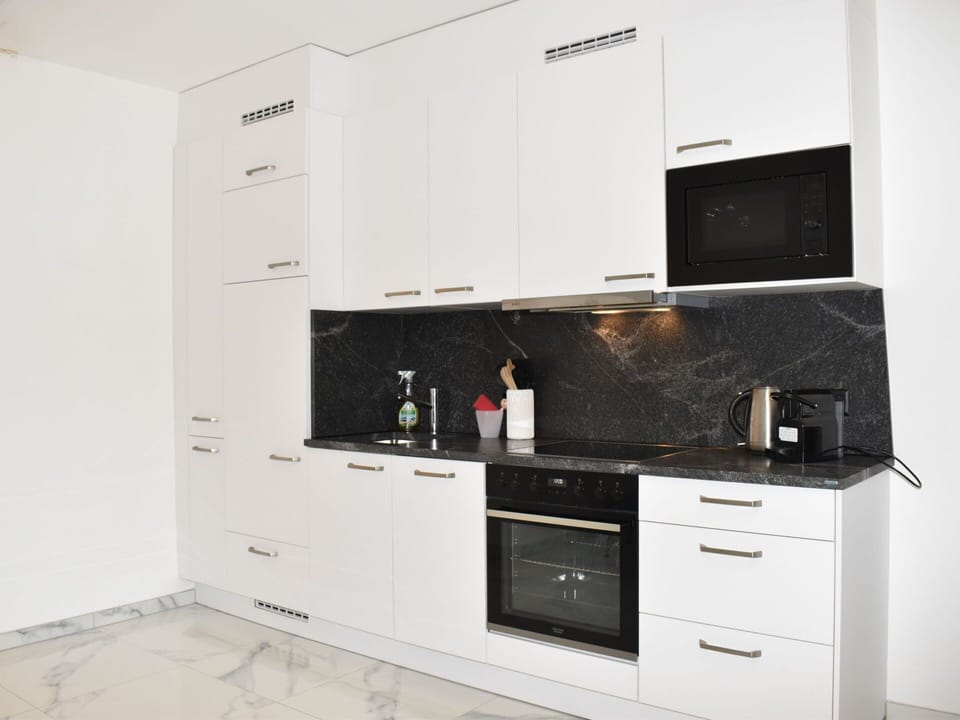 Cabinetry, Countertop, Furniture, Drawer, Building, Kitchen, Wood, Flooring, Floor, Interior Design