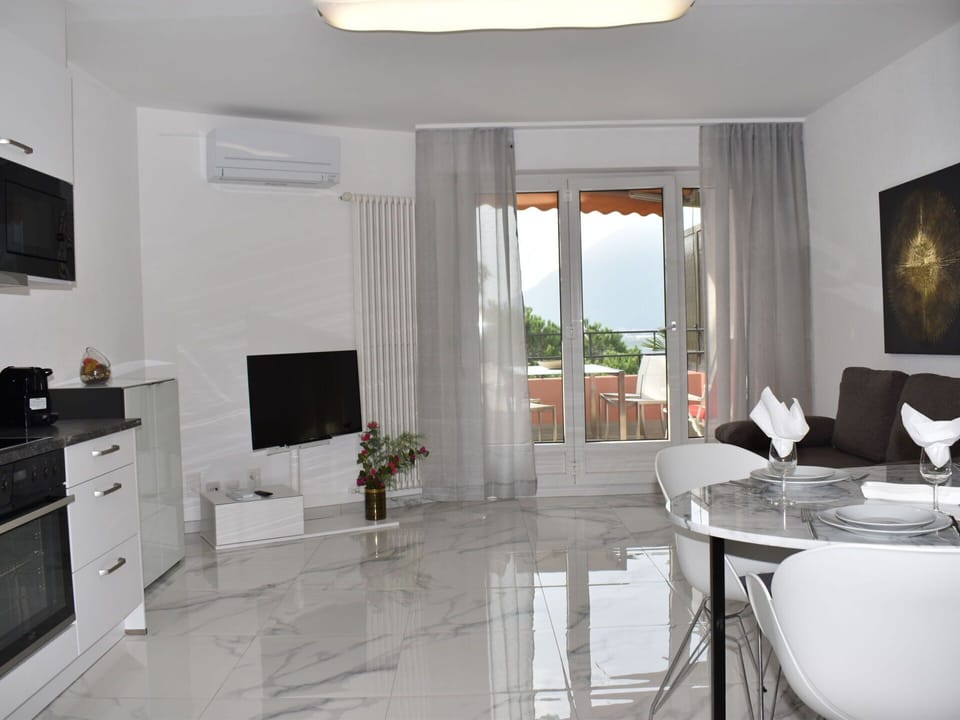 Furniture, Property, White, Interior Design, Table, Lighting, Cabinetry, Plant, Curtain, Window