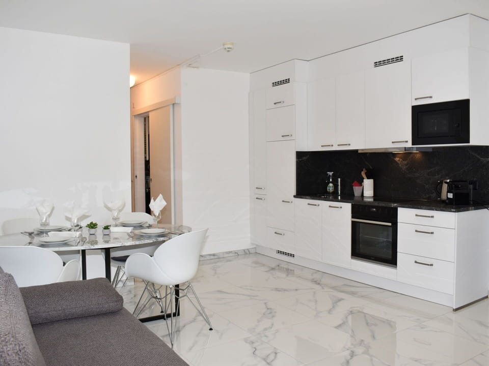 Cabinetry, Furniture, Countertop, Chair, Wood, Flooring, Kitchen Stove, Drawer, Kitchen