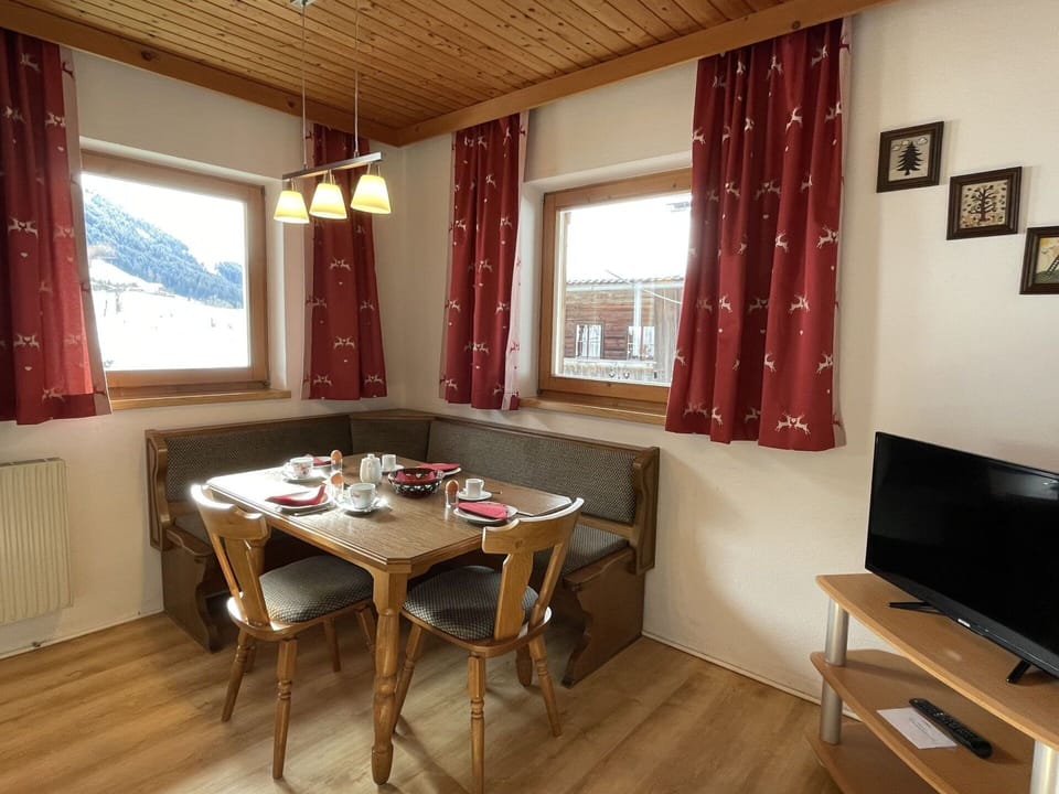Table, Furniture, Window, Wood, Curtain, Television, Textile, Building, Shade, Interior Design