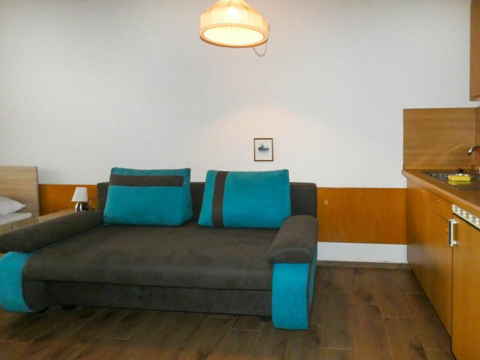 Building, Furniture, Cabinetry, Product, Couch, Azure, Wood, Lighting, House, Interior Design
