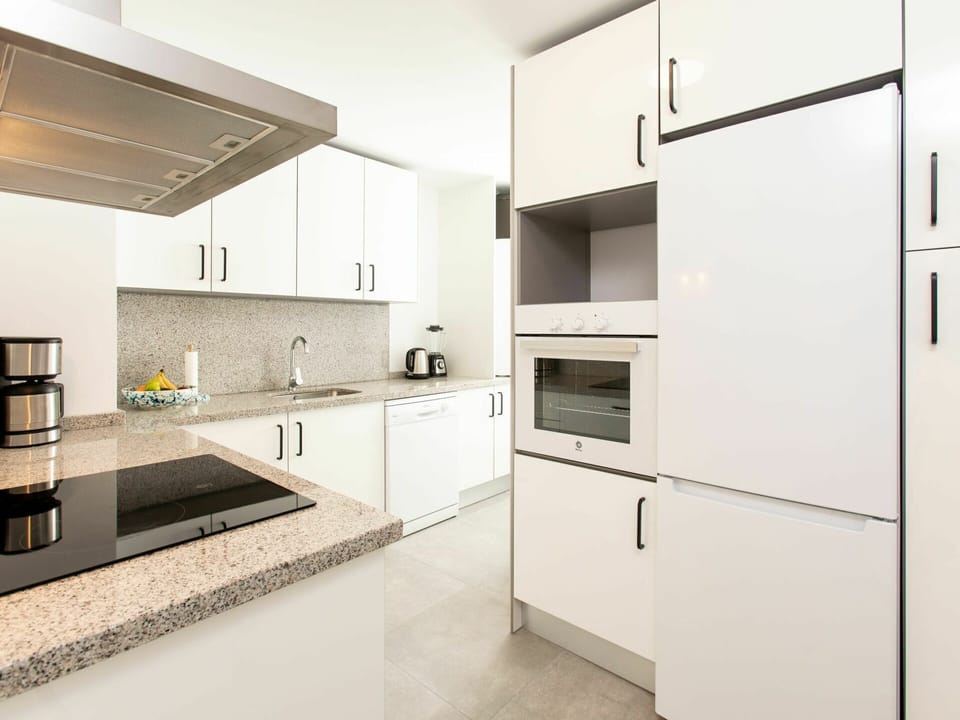 Cabinetry, Property, Countertop, Kitchen Appliance, Kitchen Stove, Home Appliance, Interior Design, Sink, Kitchen, Wood