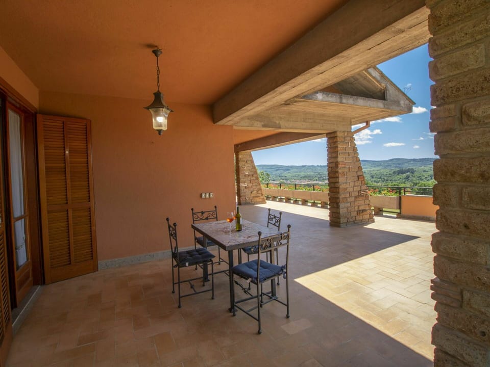 Table, Furniture, Plant, Azure, Wood, Shade, Sky, Chair, Building, Door