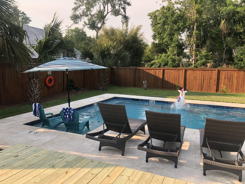 Or cool off on the pool ledge under an umbrella!