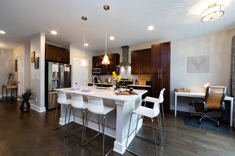 Kitchen with high-end luxury touches and giant marble island