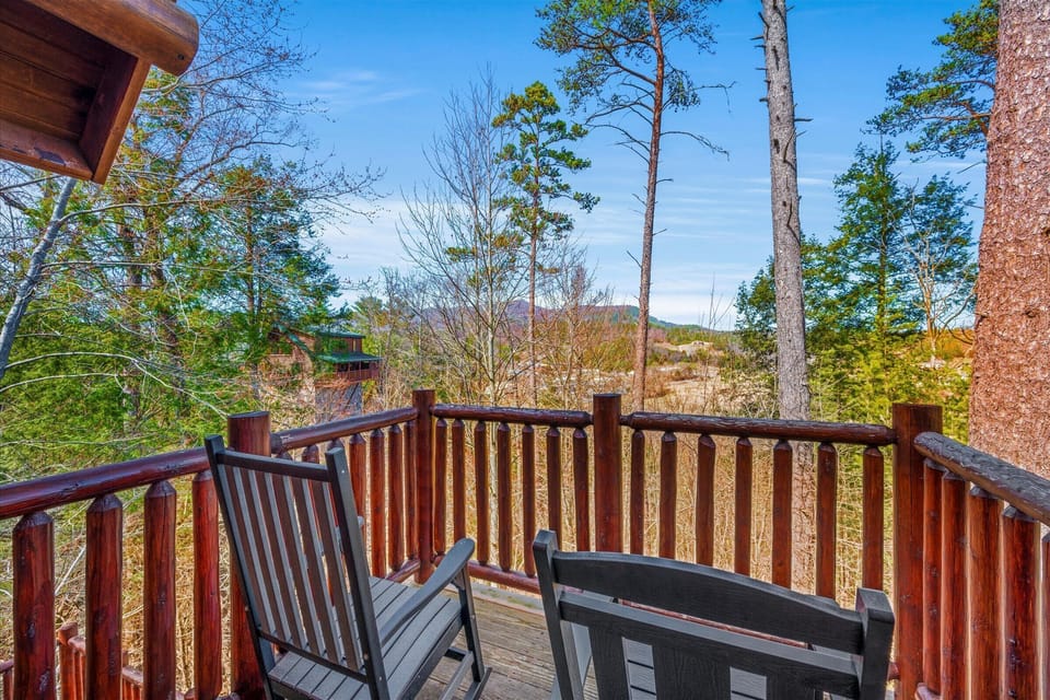 master with king bed, jacuzzi and private deck with view