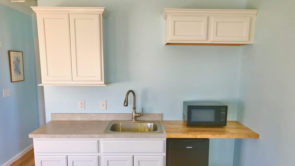 Kitchenette w/Microwave, Fridgerator and coffee/tea makers.