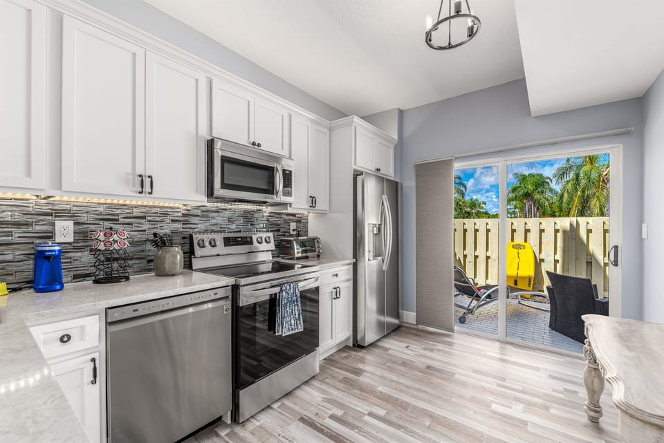 Kitchen area and slider to porch
