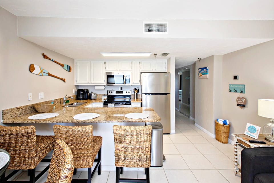 Full kitchen features lots of counter space.