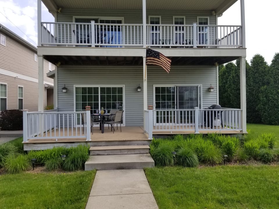 Two lovely decks from which to sit and watch the boats go by