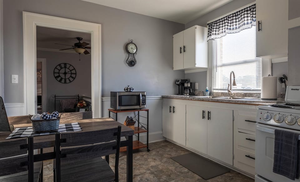 Enjoy meals at the dining table located right inside the eat‑in kitchen.