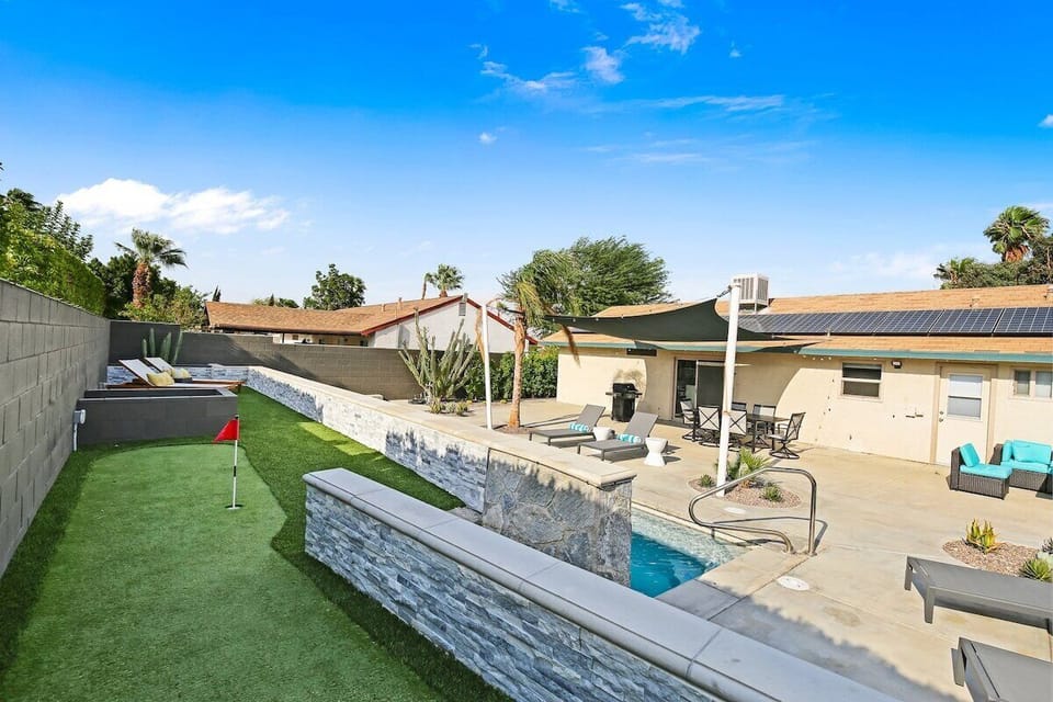 Backyard - Putting green adjacent to turfed area, perfect for outdoor games