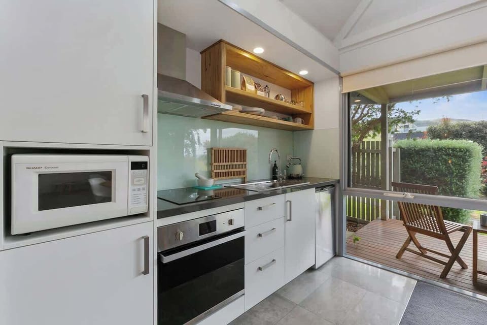Electric stove, oven and microwave are ready if you wish to cook your favorite meal 