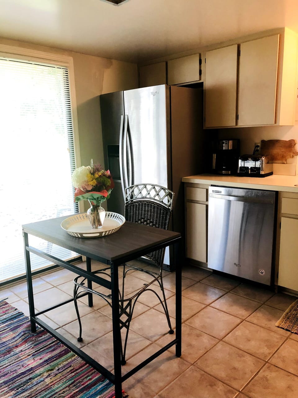 Kitchen with sliding door to patio and Golf Tee view