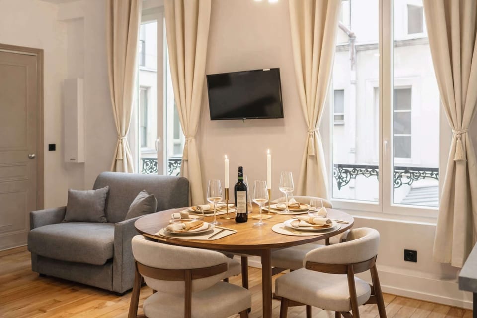 Modern dining area seating up to four