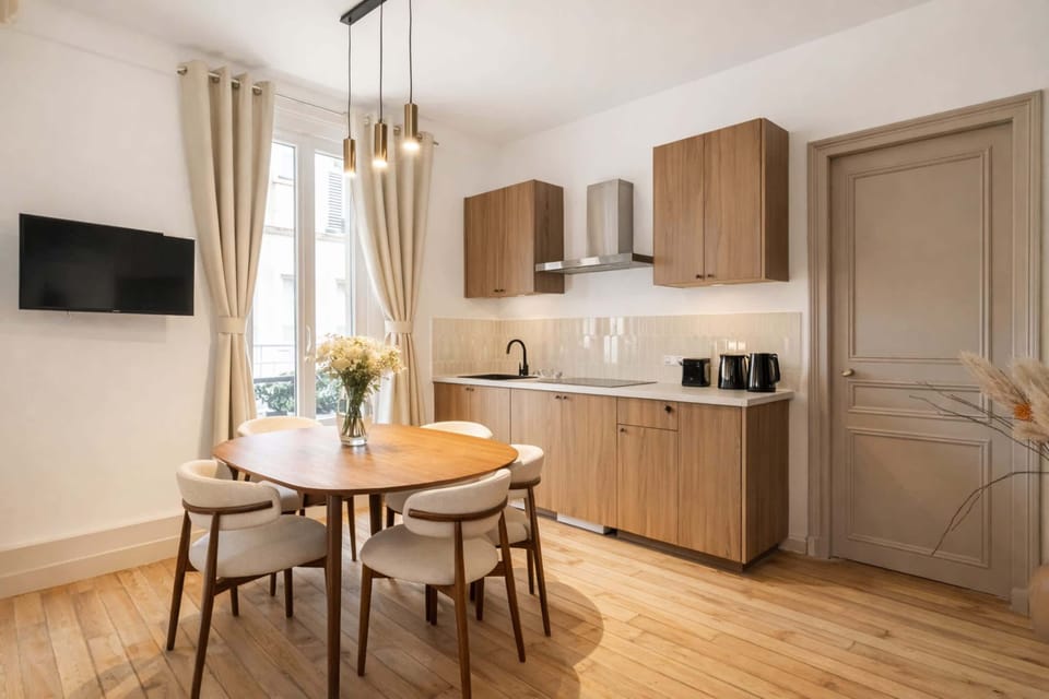 Modern dining area seating up to four
