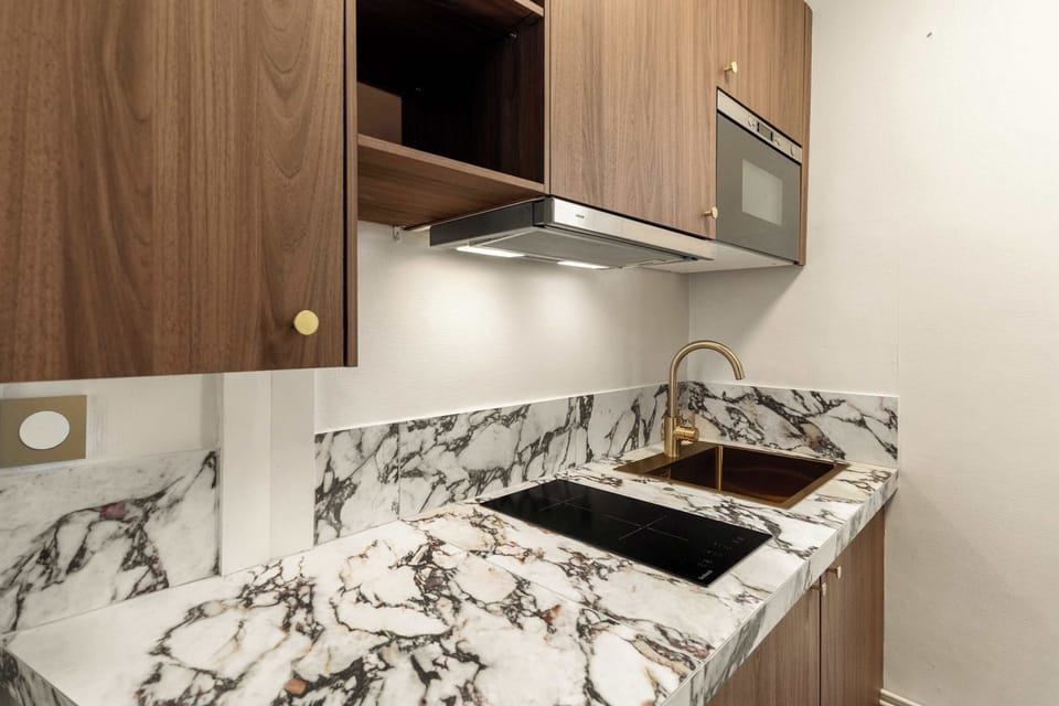 Open-plan kitchen, well equipped for your culinary adventures.