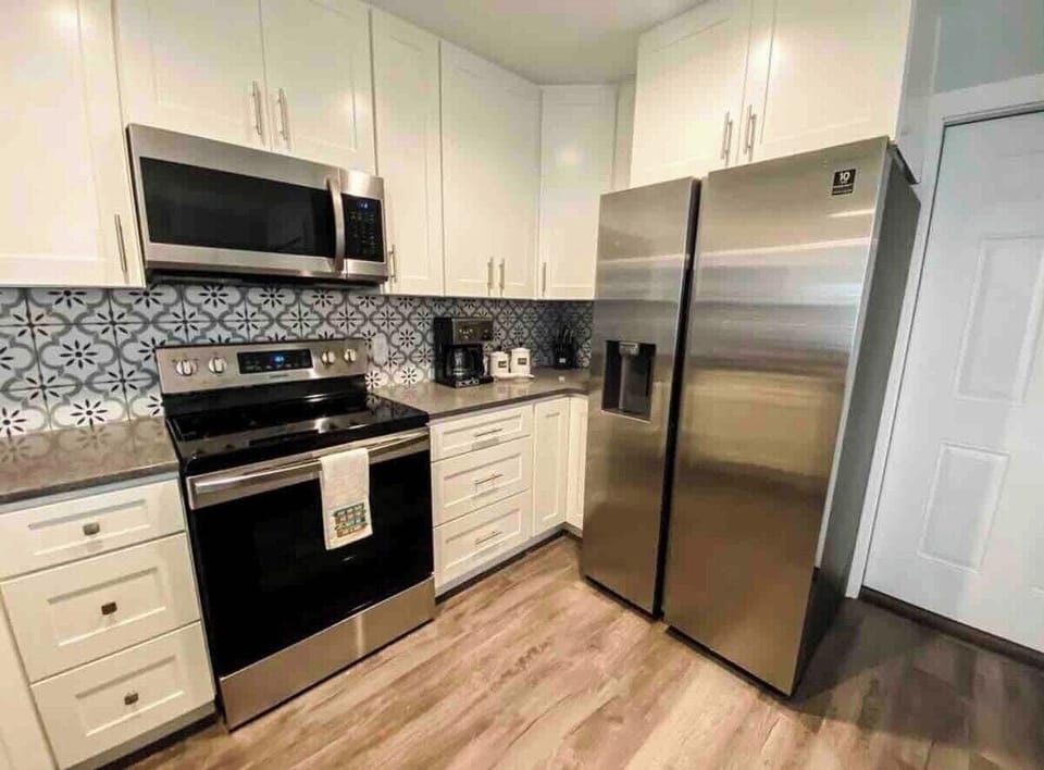 Open Kitchen with Stainless Steel Appliances