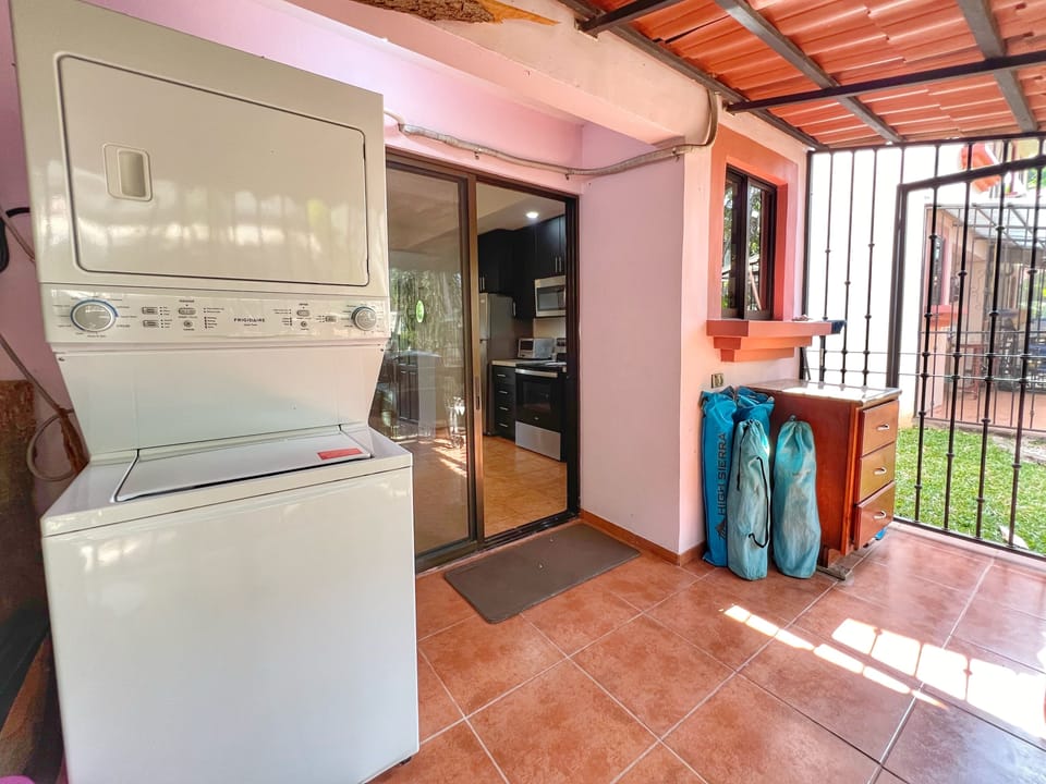 The back terrace has private laundry and a gas BBQ!