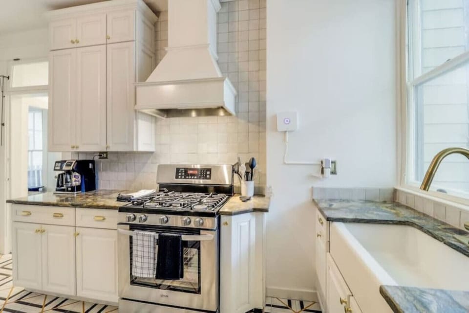 Apron sink, drip coffee maker and wow that overhead vent!!