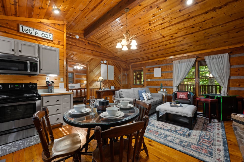 This wagon wheel table truly adds a gorgeous rustic feel to this lovely cabin
