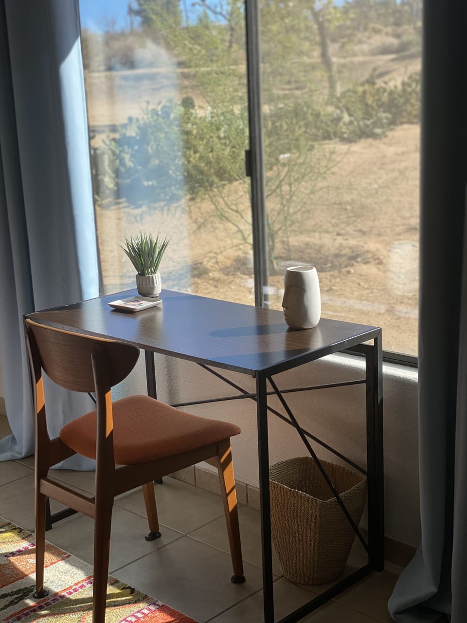 desk in master bedroom with view of the mountains