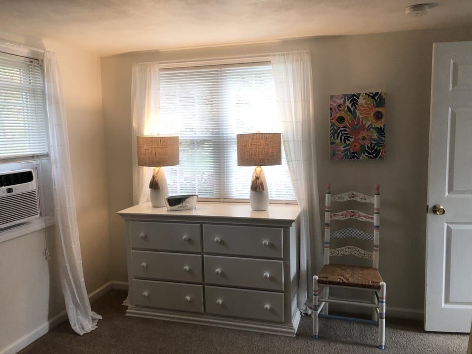 Master bedroom w/ window AC.