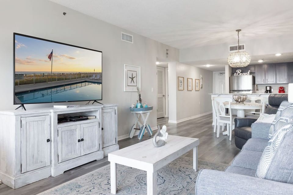 Living Area - Relax and unwind watching your favorite television shows after spending a long day on the beach.