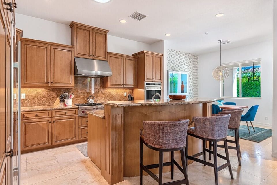 Fully Equipped Gourmet Kitchen Has Breakfast Nook With Seating For Four