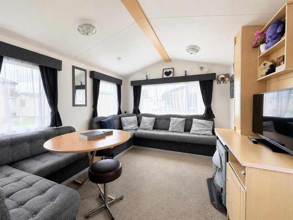 For last minute breaks, head to Skegness in England and stay at Southview Holiday Park, where you can unwind in the living room in a caravan after a day at Fantasy Island Skegness.