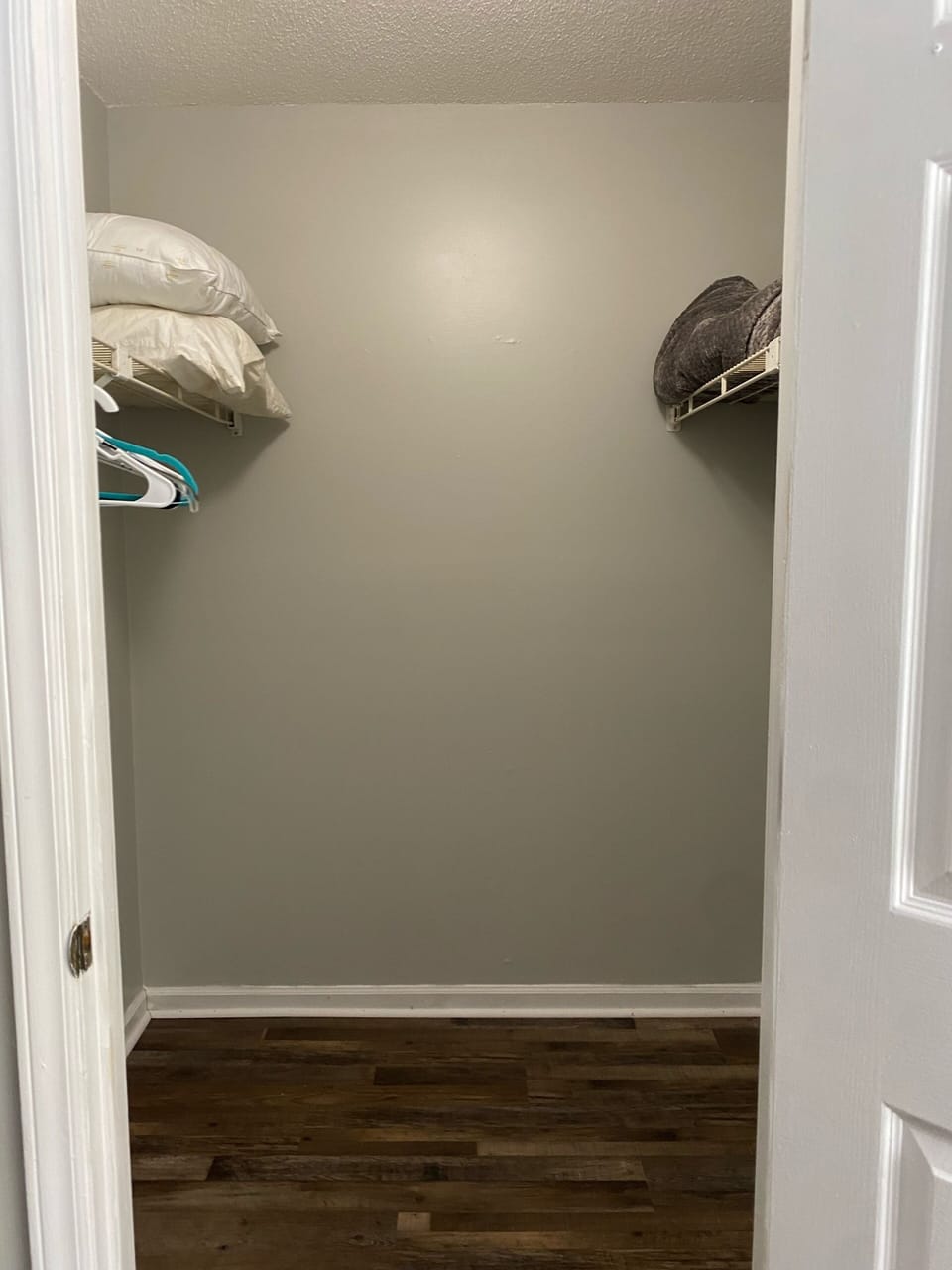 Closet with extra pillows and blankets