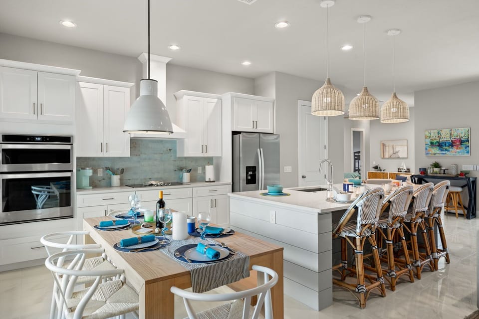 The kitchen is fully-equipped & has two dining areas