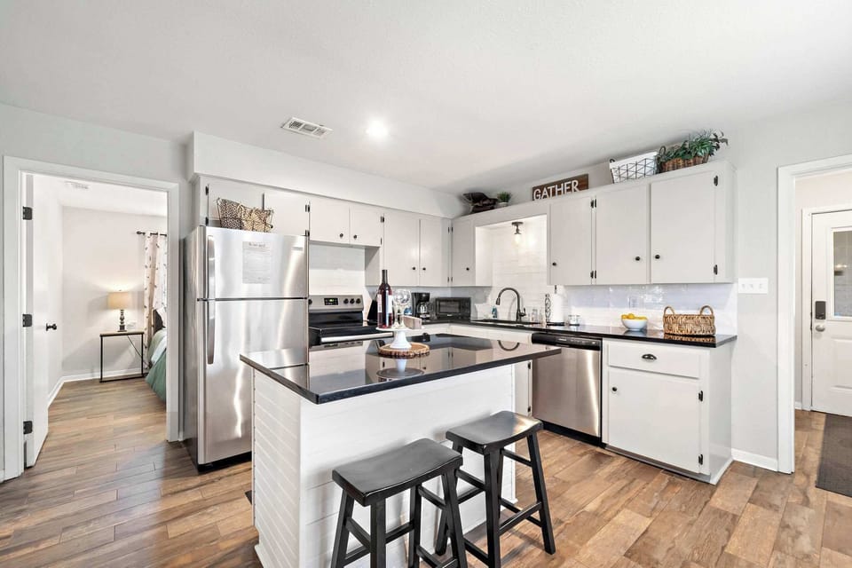 Kitchen Delight: Sleek appliances and spacious design invite culinary adventures!