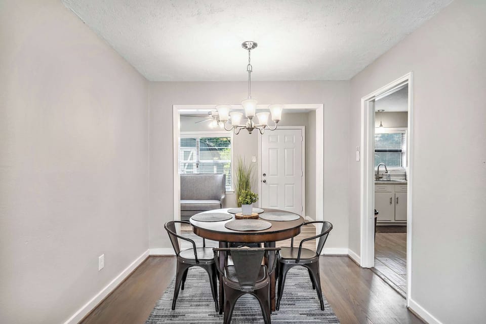 Dining Area: Gather around for delightful meals in this stylish, light-filled space.