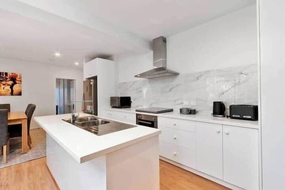 Main kitchen downstairs with modern appliances