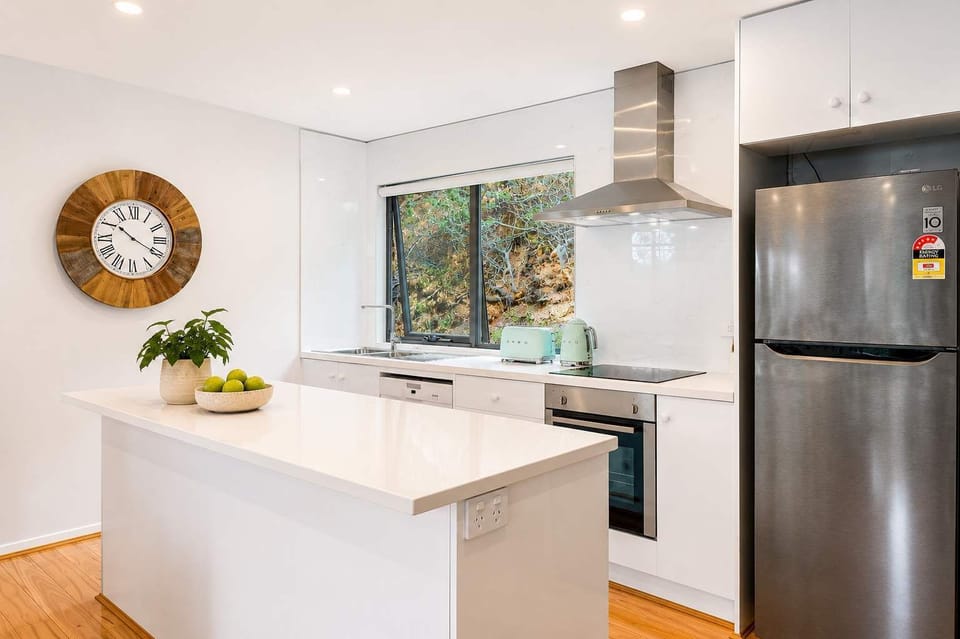 Upstairs kitchen fully operational with oven, hot plates, microwave, dish washer and fridge.