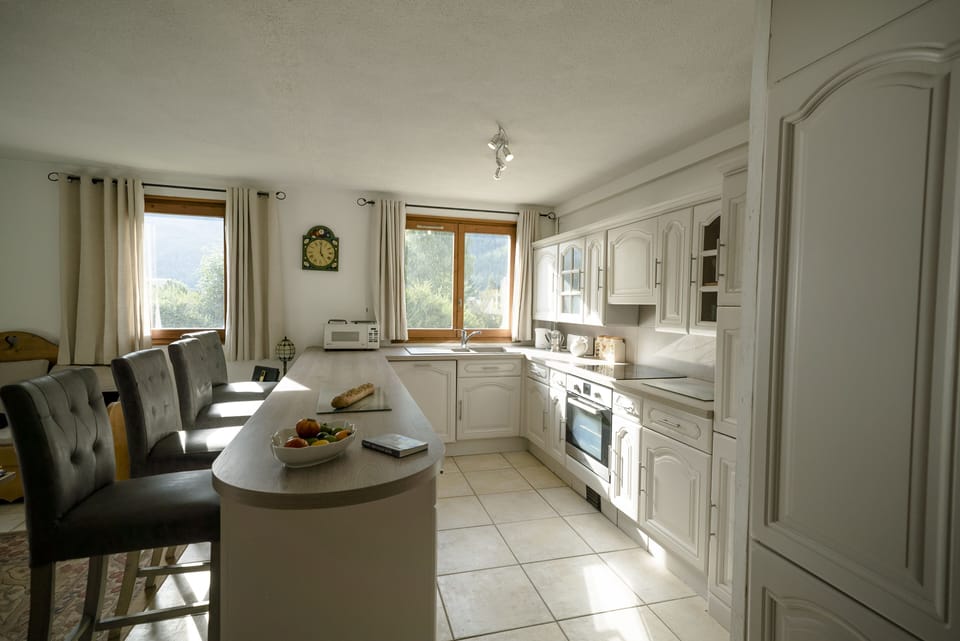 American style kitchen in open plan area with lounge.