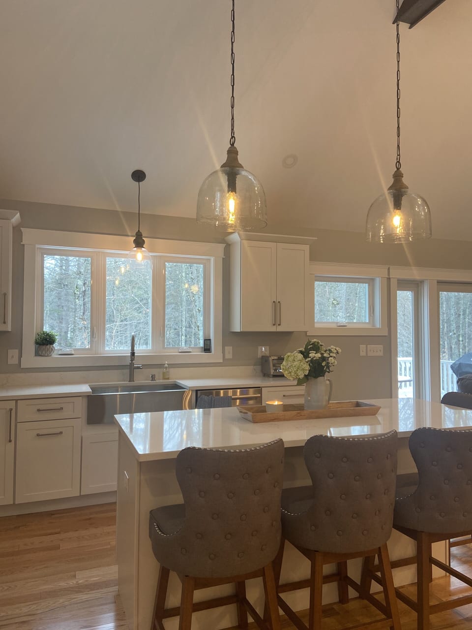 Kitchen with stainless appliances, and beverage fridge.