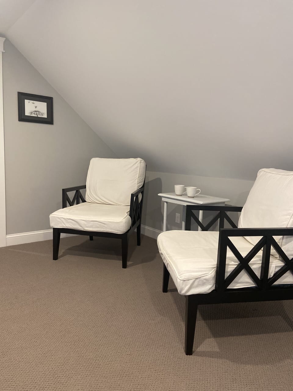 Upstairs bedroom seating area, perfect for morning coffee.