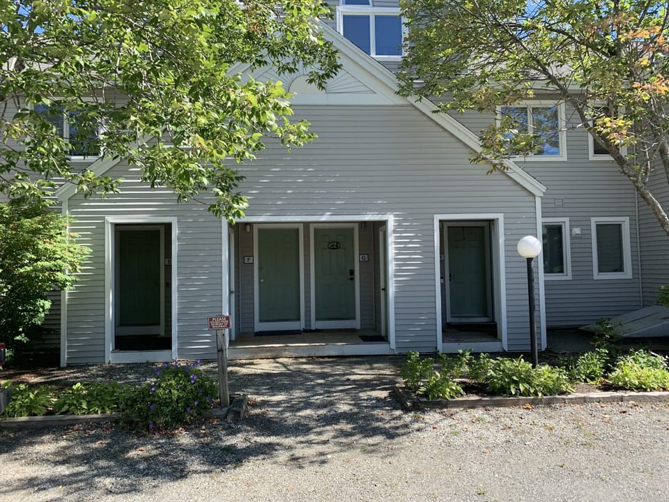 Main entrance. 1st doorway on left. 