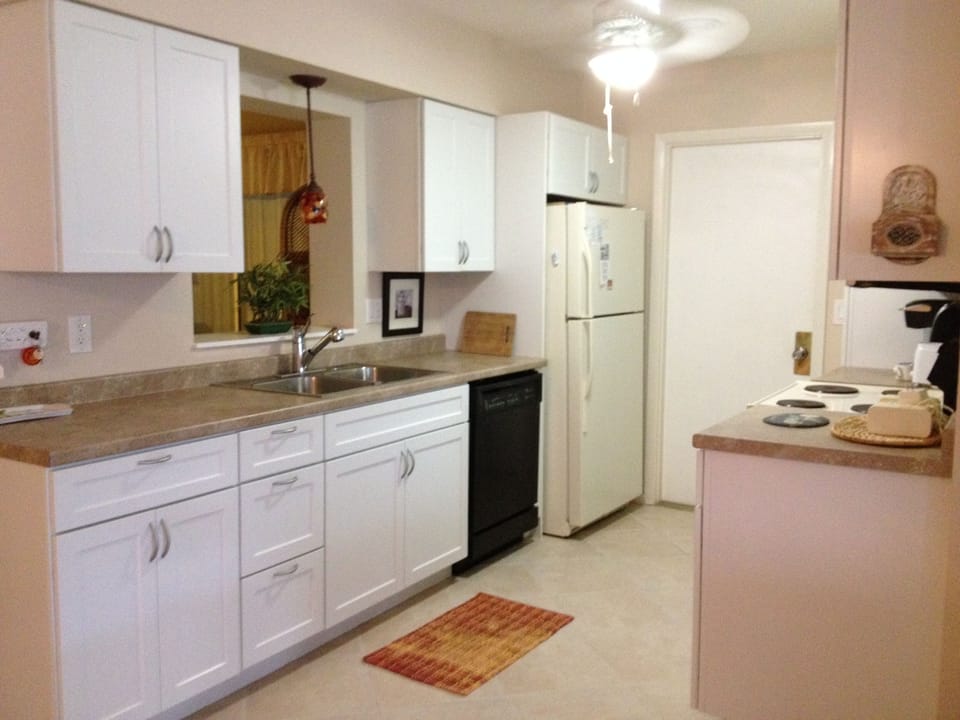 galley kitchen with all new appliances