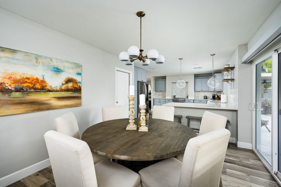 Seating for six, open kitchen, living plan, slider to patio