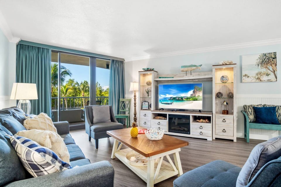 This bright, beautiful beachfront condo is the perfect home base for your island getaway.