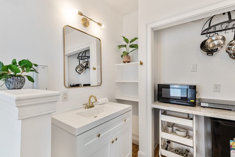 View of private kitchenette and sink