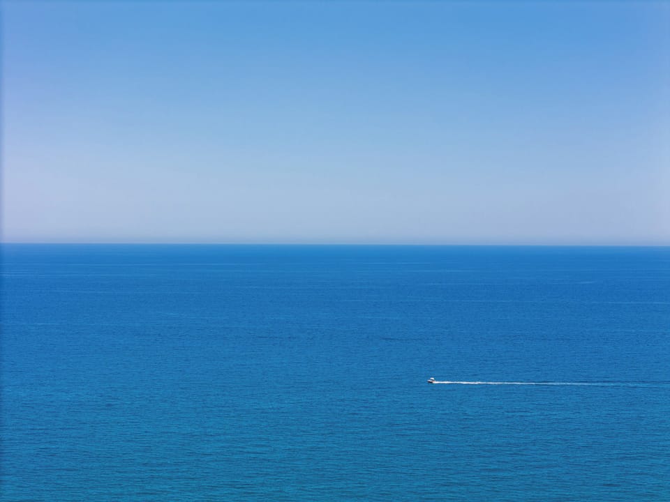 The sandy beach is just 150 m away from the villa!