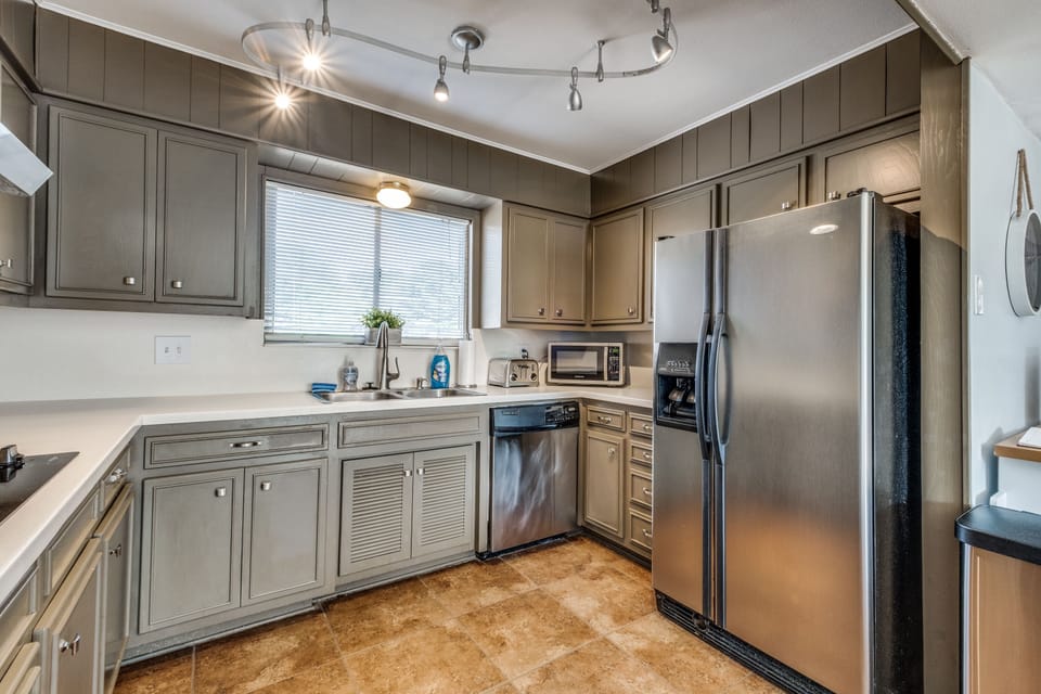 Gleaming stainless steel appliances provide a modern look, while plenty of gadgets make it easy to whip up culinary creations of any kind.  We offer a crock pot, rice cooker, blender, toaster, and all of the accessories needed to ACTUALLY use the kitchen.