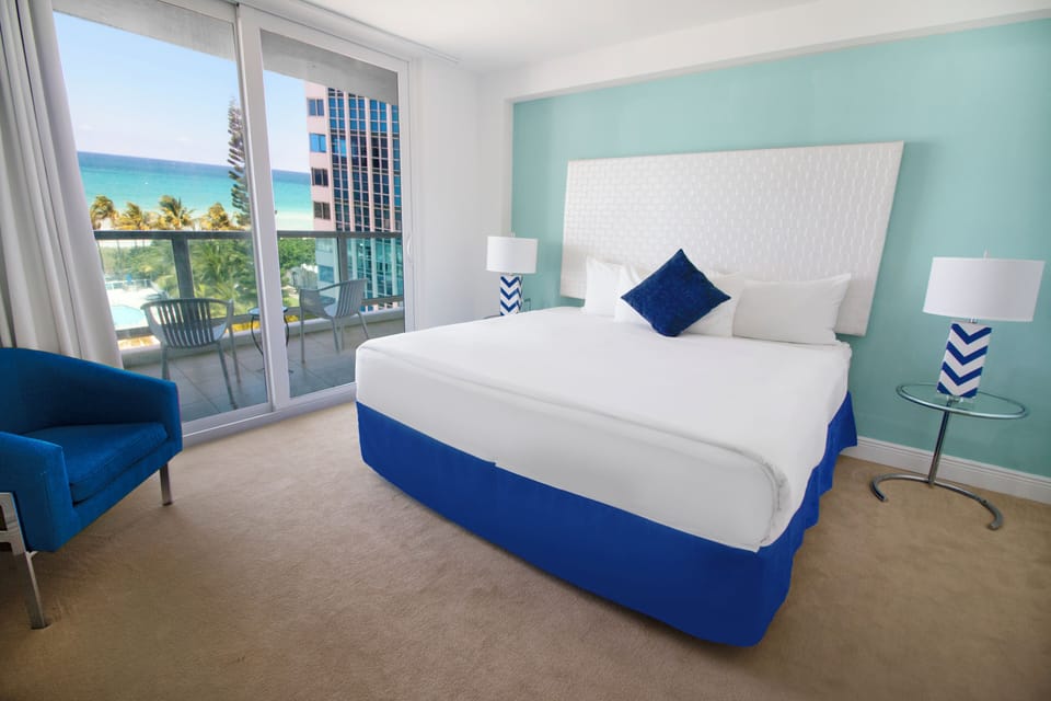 Wake up to sea views from a bright, plush bed.