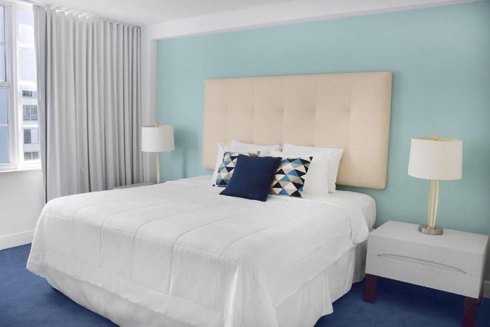 Stretch out comfortably in a clean, modern bedroom haven.