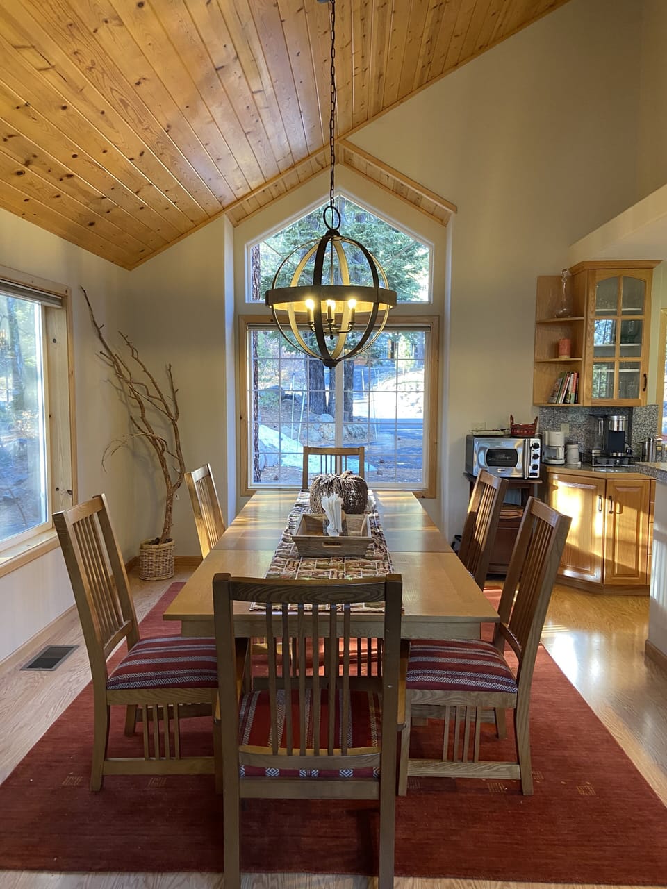 Two dining tables in great room seating for kids and adults

