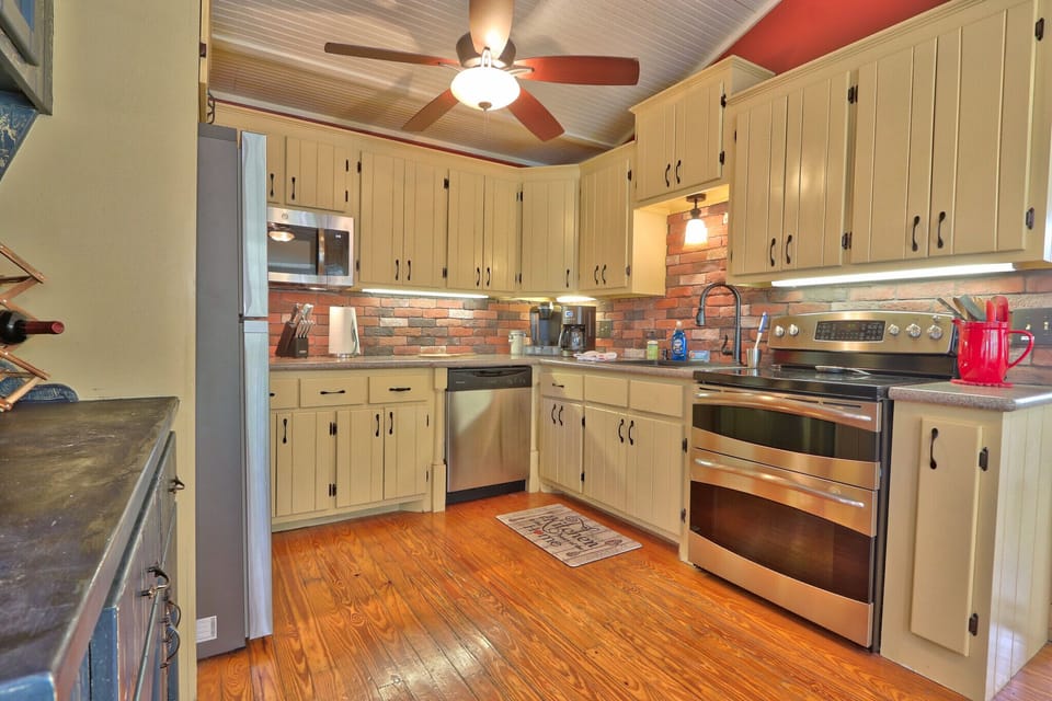 Full kitchen with stainless steel appliances